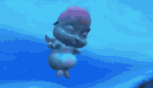 a cartoon character with pink hair is swimming in the water .