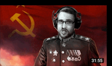 a man in a military uniform with a hammer and sickle in the background and the time of 31:55