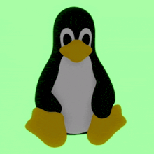 a penguin with a yellow beak is sitting on a green background