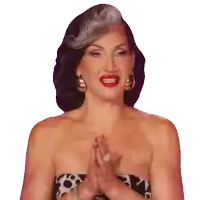 a woman with gray hair and red lips is wearing a strapless top and earrings