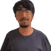 a pixelated image of a man wearing glasses and a black shirt