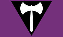 a black triangle with a white axe on it