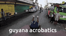 a guyana acrobatics poster shows a man doing a trick