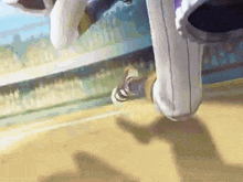 a person is standing on a basketball court with a shadow on the ground