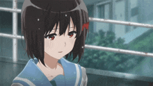a girl with short brown hair is wearing a school uniform