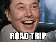 elon musk is smiling with the words road trip written below him
