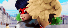 a ladybug and cat noir are hugging each other in a cartoon .