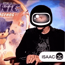 a man wearing a helmet and goggles is sitting in front of a movie poster for sonic the hedgehog .