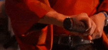 a close up of a person holding a lightning bolt .