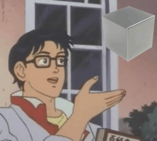 a man with glasses is holding a book in front of a cube with chinese writing on it