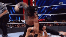 Roman Reigns Pound Punch Wrestle Mania GIF - Roman Reigns Pound Punch Wrestle Mania Clubbing Blows GIFs