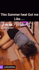 a woman laying on the floor with the caption this summer heat got me like ....