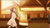 two anime girls are standing next to each other in a building .