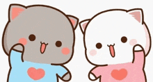 two cute cartoon cats are standing next to each other and holding hands .