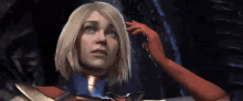 a woman in a superhero costume is scratching her head with her hand .