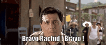 a man with a white substance on his forehead says bravo rachid bravo