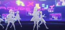 a group of anime girls are dancing in front of a sign that says agure