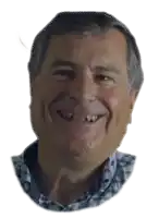 a close up of a man 's face with no teeth