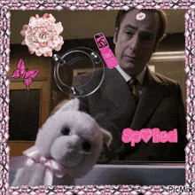 a man in a suit and tie is looking at a stuffed animal with the words spyted written on the bottom