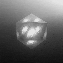 a black and white image of a cube with a face on it
