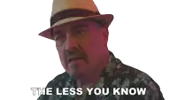 a man wearing a hat and a shirt says the less you know