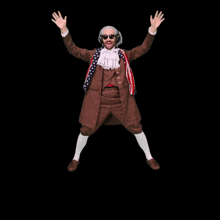 a man dressed as benjamin franklin is jumping in the air with his arms in the air