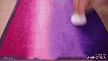 a close up of a person 's foot on a pink and purple carpet made in animatica