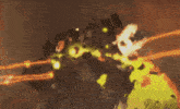 a blurred image of a person holding a camera in front of a fire
