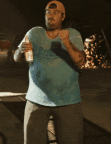 a man in a blue shirt that says jordan 's