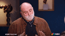 a man with a beard is on nbc 's nbc es chef show