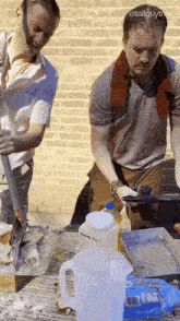 a gallon of all purpose flour sits next to a pitcher of water