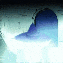 a blue wizard hat is floating in the air