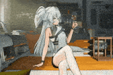 a anime girl is sitting on the floor holding a glass of wine .