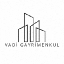 the logo for vadi gayrimenkul is a black and white image of a building .