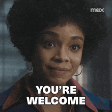 a woman says " you 're welcome " in white letters