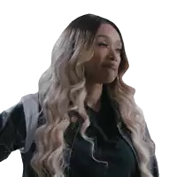 a woman with long blonde hair wearing a black jacket