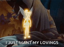 tinkerbell is glowing in the dark and says `` i just want my lovings '' while standing next to a tree .