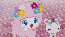 a white rabbit with a flower on her head