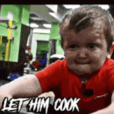 a little boy in a red shirt with let him cook written on the bottom right