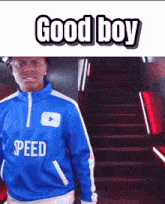 a man wearing a blue jacket that says speed