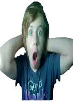 a boy wearing a blue shirt with the word cats on it is making a surprised face