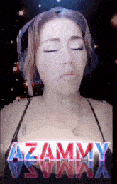 a woman wearing headphones and a necklace with the name azammy