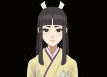 a girl with long dark hair and a bow in her hair looks sad