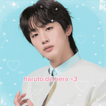 a close up of a person holding a flower with the words haruto de hera < 3 below