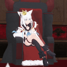 a girl with white hair is sitting on a throne