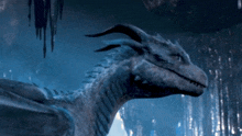 a close up of a dragon in a cave
