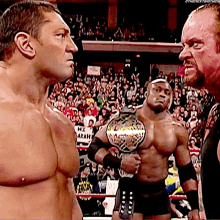 The Undertaker Batista GIF - The Undertaker Batista World Heavyweight Champion GIFs