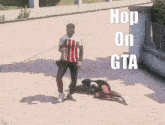 a man wearing a mask stands in front of a sign that says hop on gta