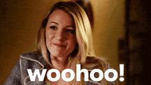 a woman is smiling with the words woohoo written in front of her