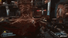 a skeleton is being attacked by a monster in a video game with a lot of blood coming out of it .
